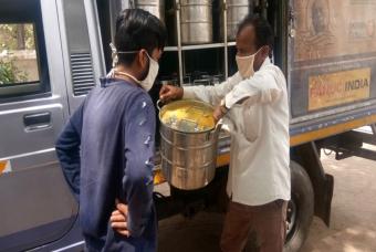Staff unloading the vessels