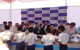 Students served food at Surat kitchen inauguration